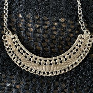 Moon shaped tribal like necklace